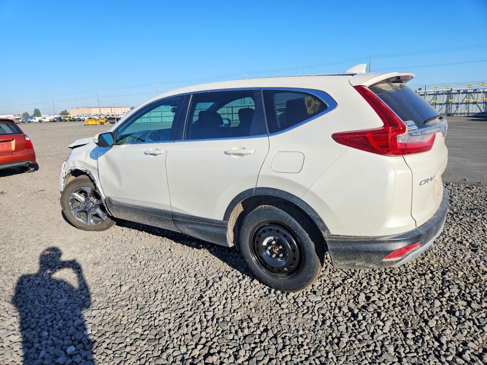 Photo 2 from auction – 2018 HONDA CR-V with VIN 2HKRW2H55JH646205