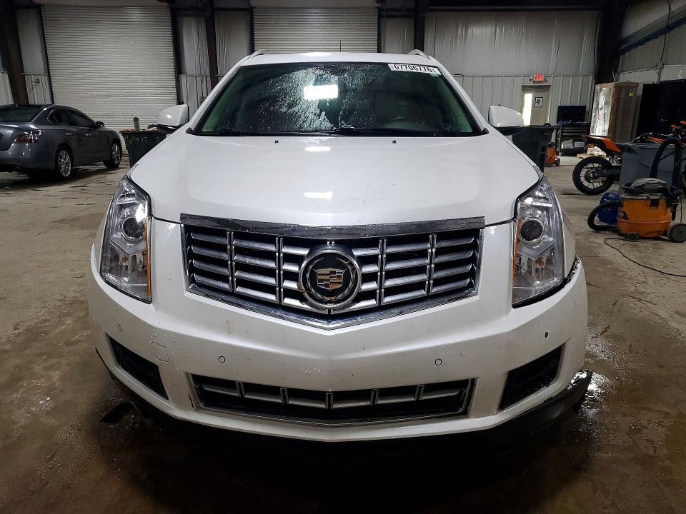 Photo 5 from auction – 2014 CADILLAC SRX with VIN 3GYFNBE32ES663610