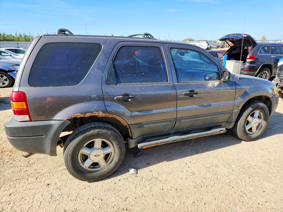 Photo 3 from auction – 2003 FORD ESCAPE with VIN 1FMYU02133KB21526