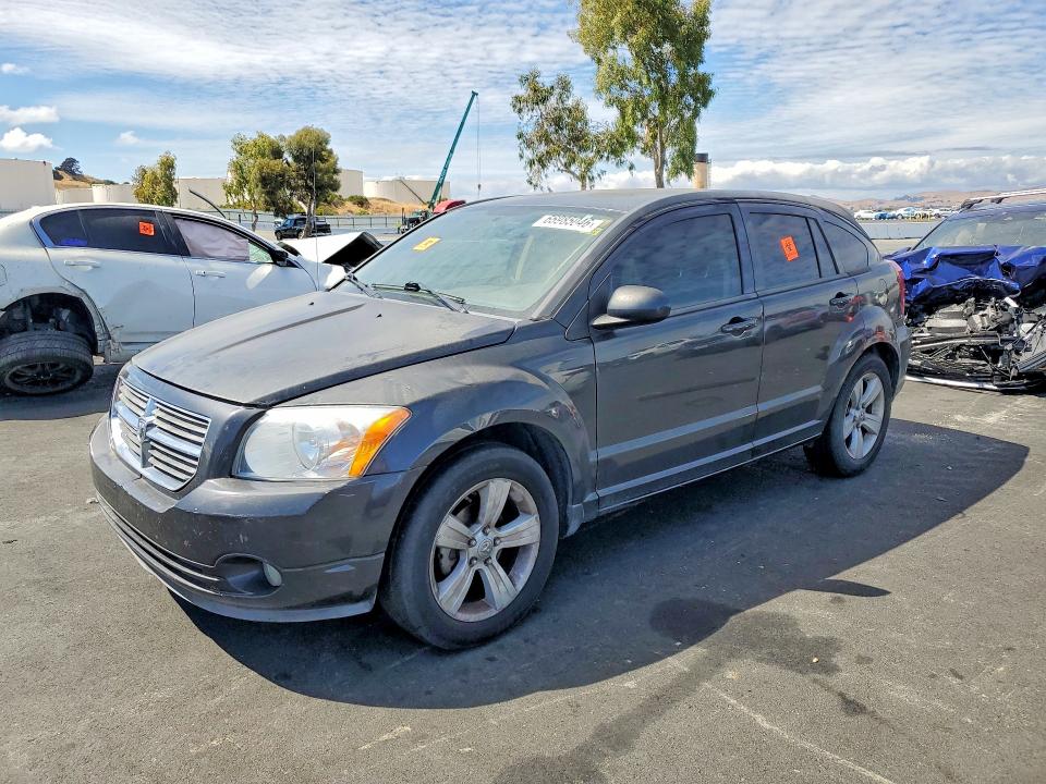 DODGE CALIBER 2011 with VIN 1B3CB3HA3BD125531 - Photo from auction