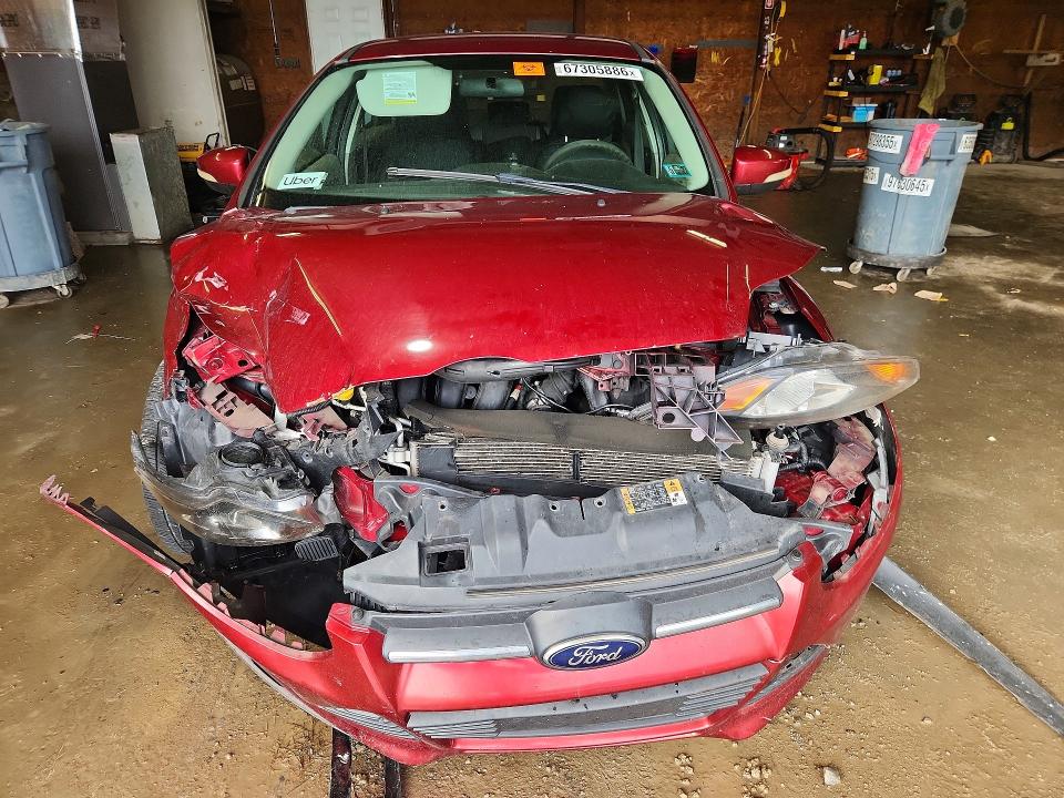 Photo 5 from auction – 2014 FORD FOCUS with VIN 1FADP3F25EL274524