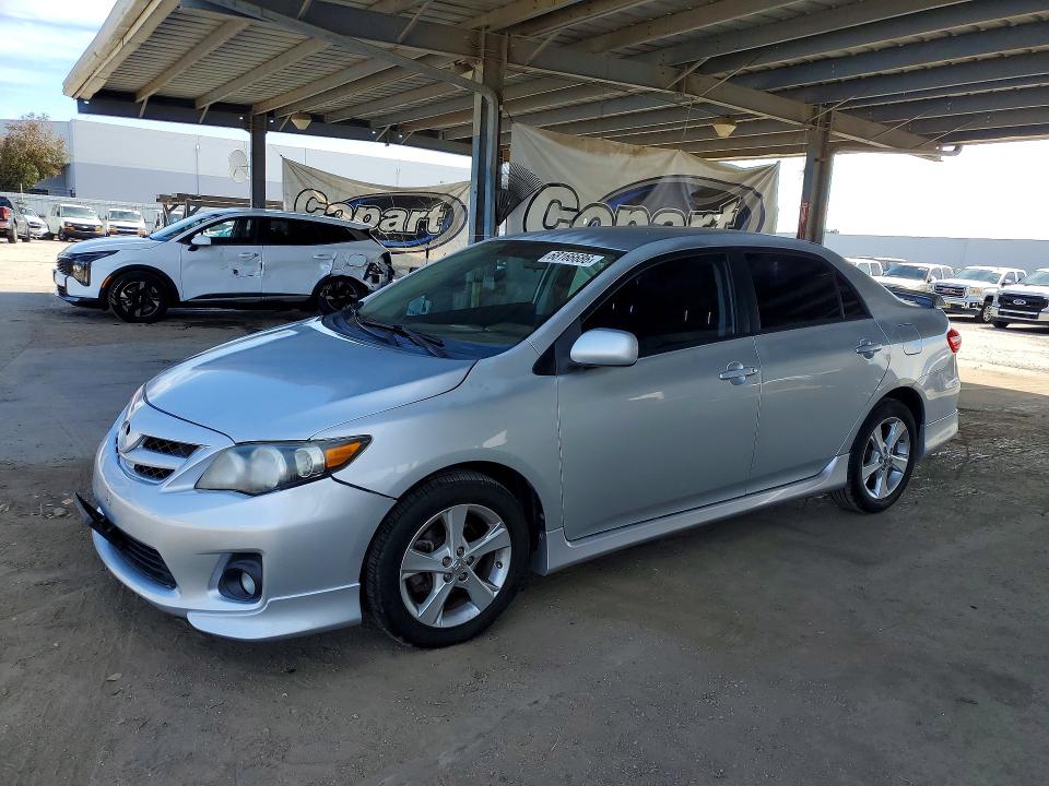 TOYOTA COROLLA 2011 with VIN 2T1BU4EEXBC709083 - Photo from auction