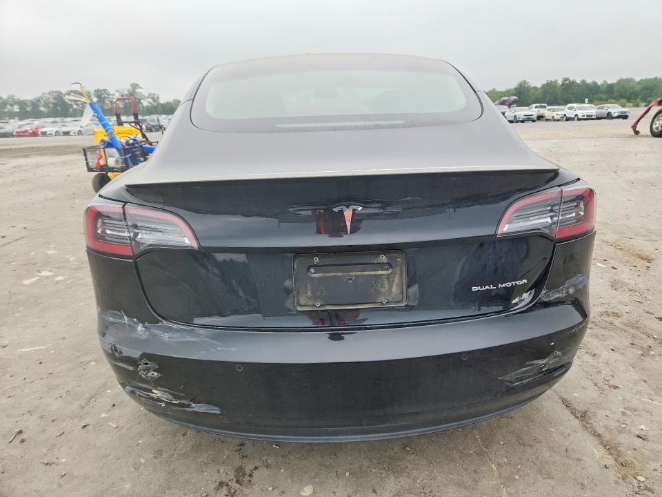 Снимка 6 от търг – 2022 TESLA MODEL 3 с VIN 5YJ3E1EB0NF112059
