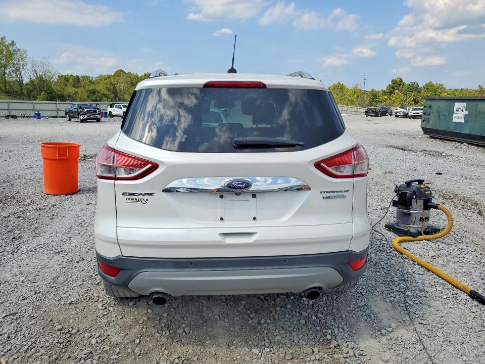 Photo 6 from auction – 2016 FORD ESCAPE with VIN 1FMCU0J97GUB43430