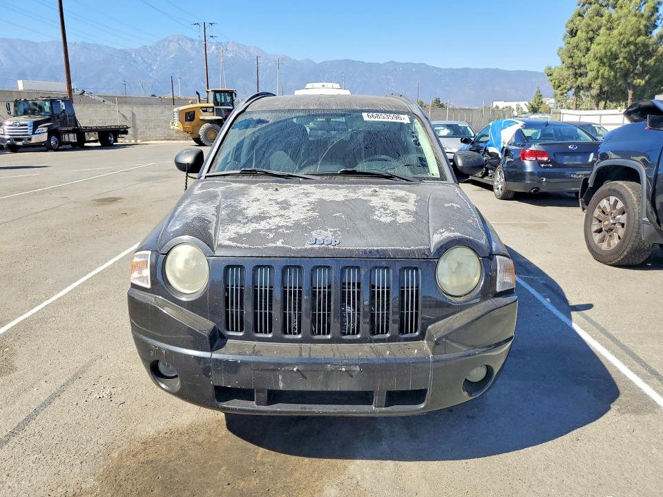 Photo 5 from auction – 2009 JEEP COMPASS with VIN 1J4FT47B29D221289