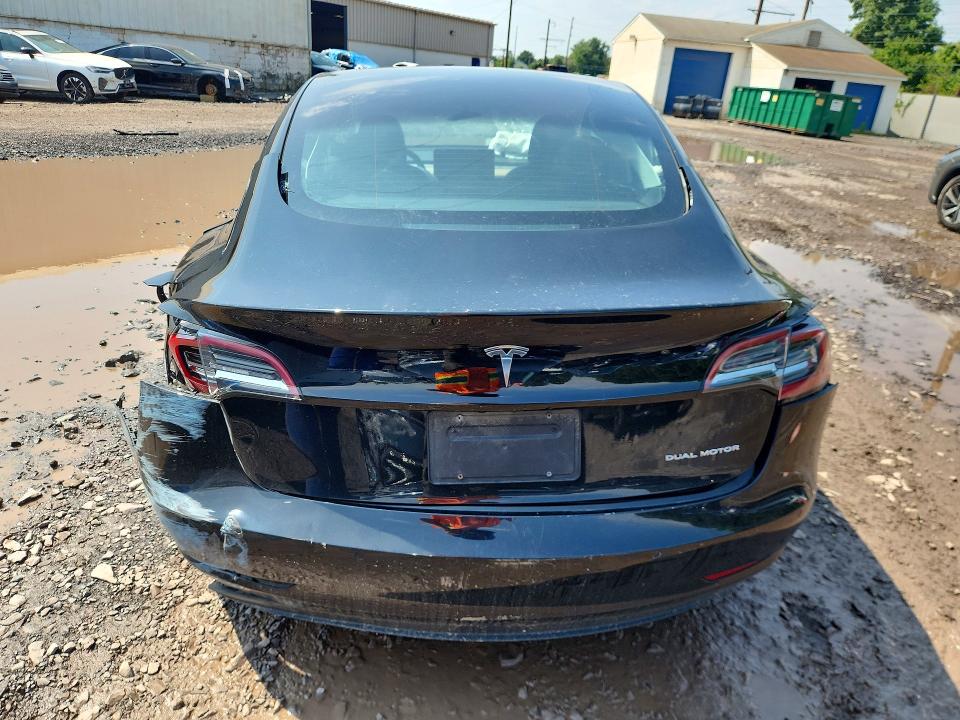 Снимка 6 от търг – 2021 TESLA MODEL 3 с VIN 5YJ3E1EBXMF974834
