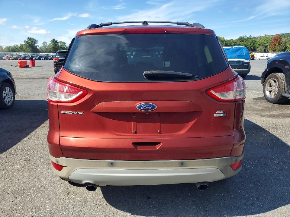 Снимка 6 от търг – 2014 FORD ESCAPE с VIN 1FMCU9G99EUA66116