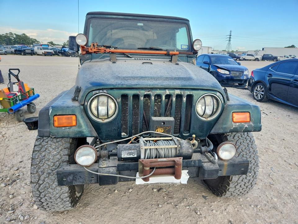Photo 5 from auction – 2000 JEEP WRANGLER with VIN 1J4FA59S8YP728946