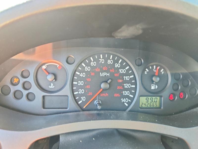 Photo 9 from auction – 2006 FORD FOCUS with VIN 1FAFP31N06W141552