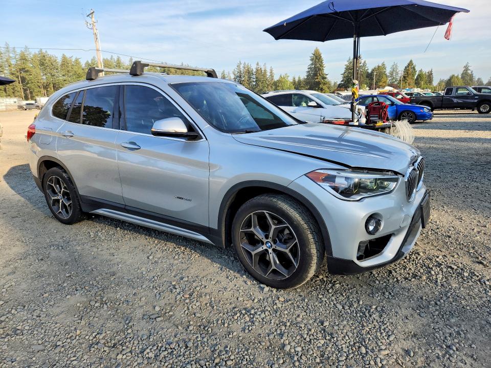 Photo 4 from auction – 2016 BMW X1 with VIN WBXHT3C39GP881240