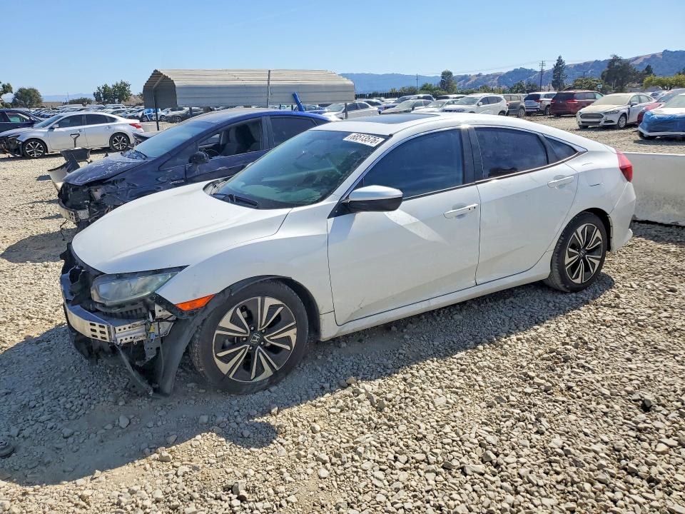 HONDA CIVIC 2016 with VIN 2HGFC1F37GH631585 - Photo from auction