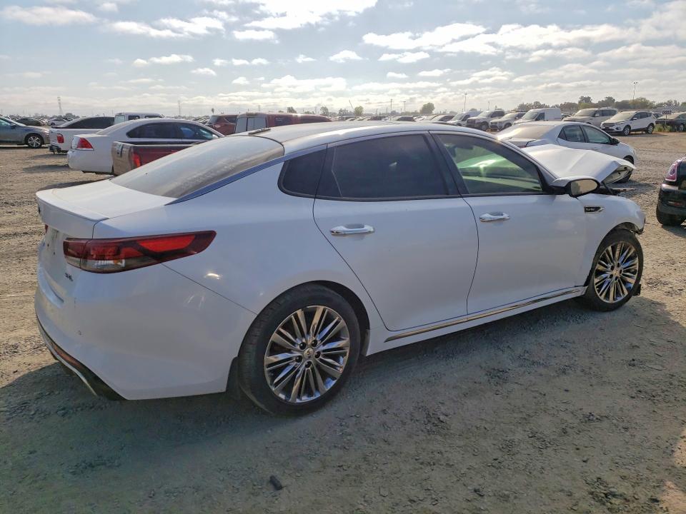 Photo 3 from auction – 2018 KIA OPTIMA with VIN 5XXGV4L25JG227172