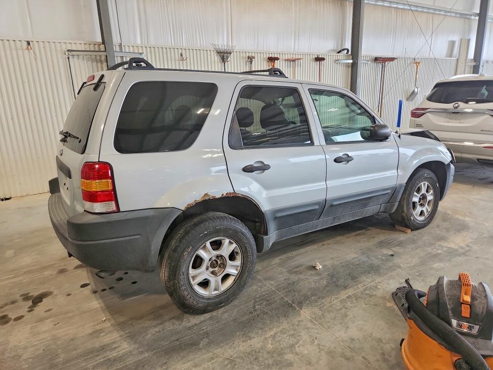 Photo 3 from auction – 2003 FORD ESCAPE with VIN 1FMYU93103KC88722