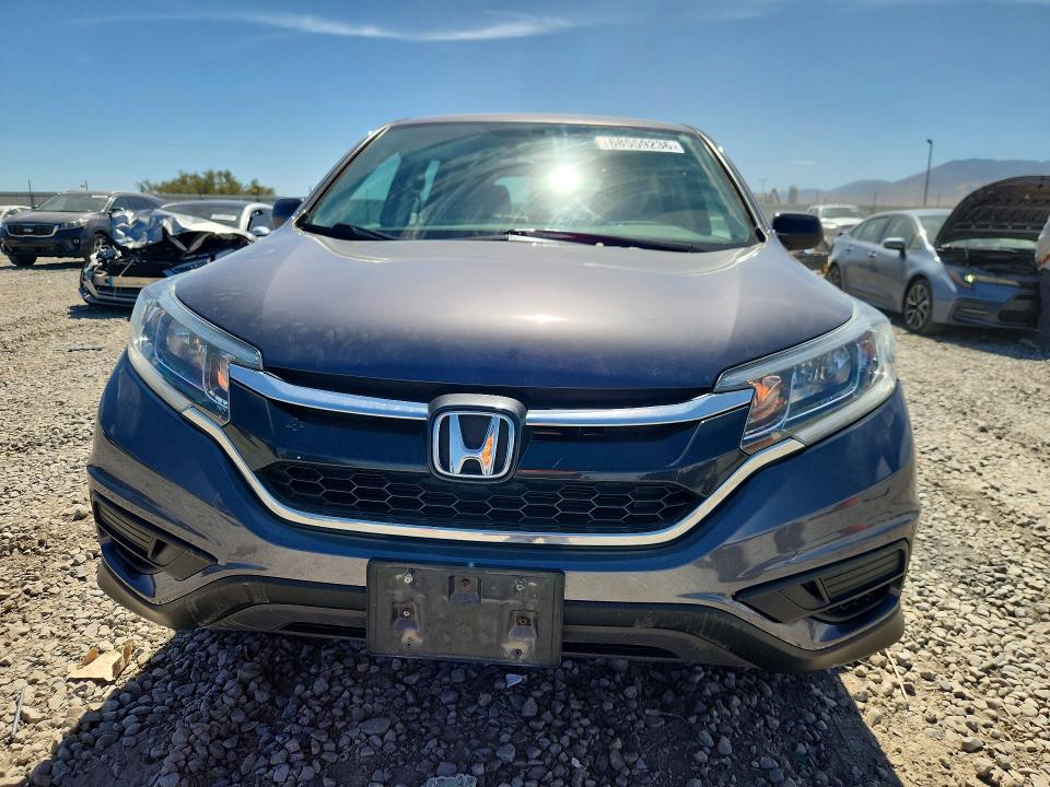 Photo 5 from auction – 2015 HONDA CR-V with VIN 2HKRM4H39FH696418
