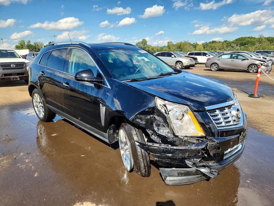 Zdjęcie 4 z aukcji – 2014 CADILLAC SRX z VIN 3GYFNCE33ES517609
