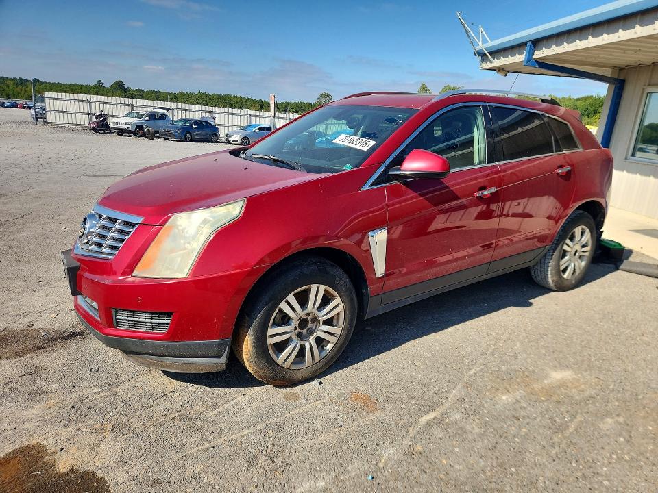 CADILLAC SRX 2015 with VIN 3GYFNBE34FS622946 - Photo from auction