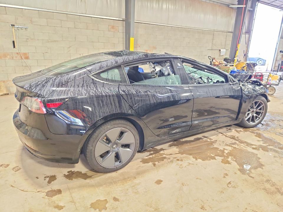Снимка 3 от търг – 2023 TESLA MODEL 3 с VIN 5YJ3E1EA1PF556433