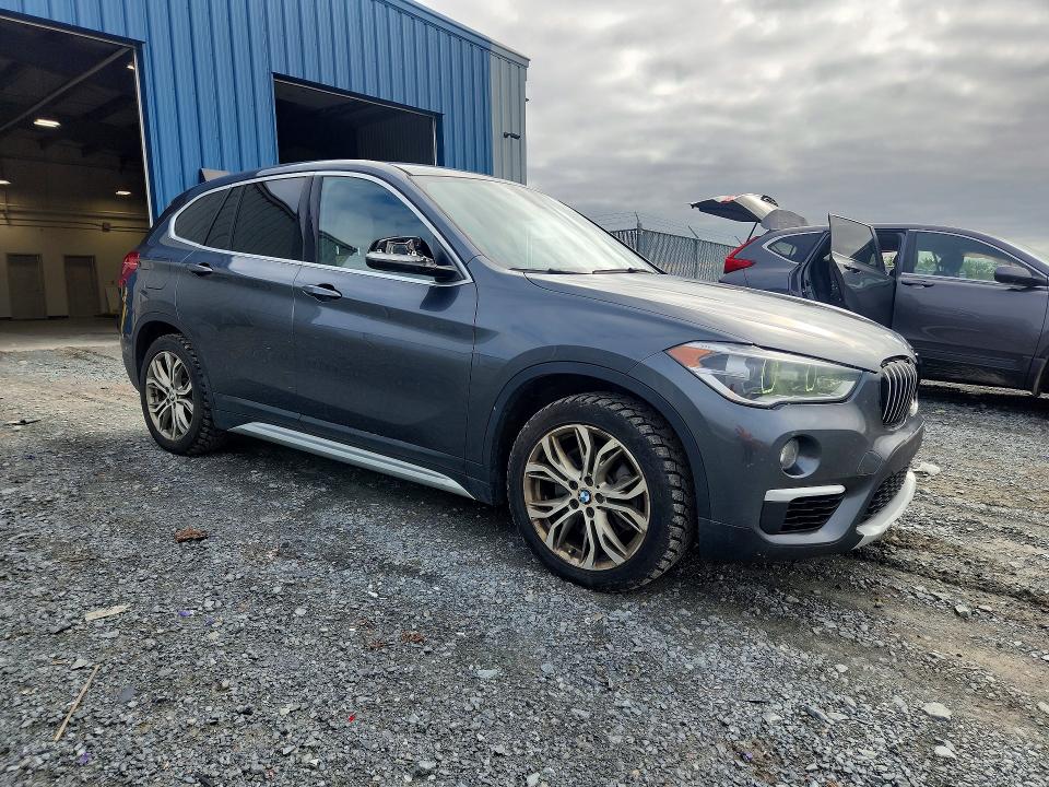 Photo 4 from auction – 2018 BMW X1 with VIN WBXHT3C33J5L26903