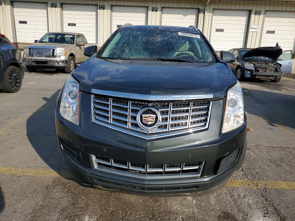 Снимка 5 от търг – 2014 CADILLAC SRX с VIN 3GYFNBE33ES545341