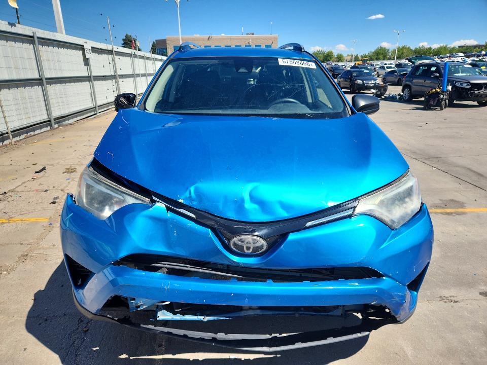 Photo 5 from auction – 2017 TOYOTA RAV4 with VIN JTMZFREV2HJ124145