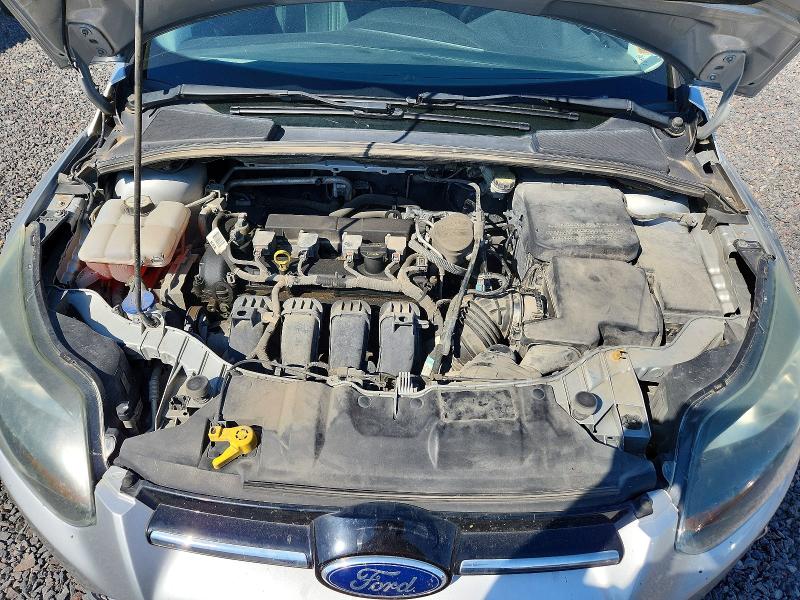 Снимка 11 от търг – 2013 FORD FOCUS с VIN 1FADP3N2XDL200208
