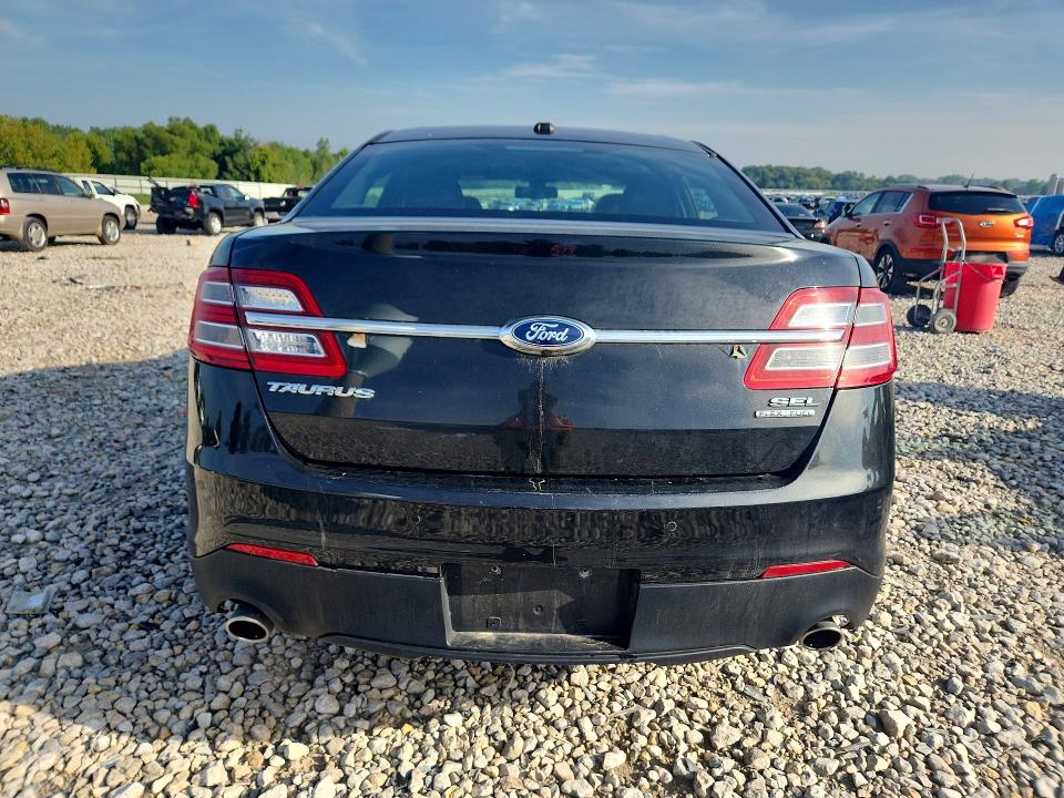 Photo 6 from auction – 2013 FORD TAURUS with VIN 1FAHP2E85DG180488