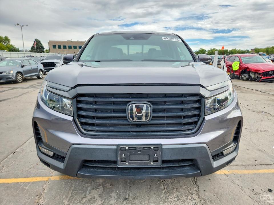 Photo 5 from auction – 2022 HONDA RIDGELINE with VIN 5FPYK3F52NB013060