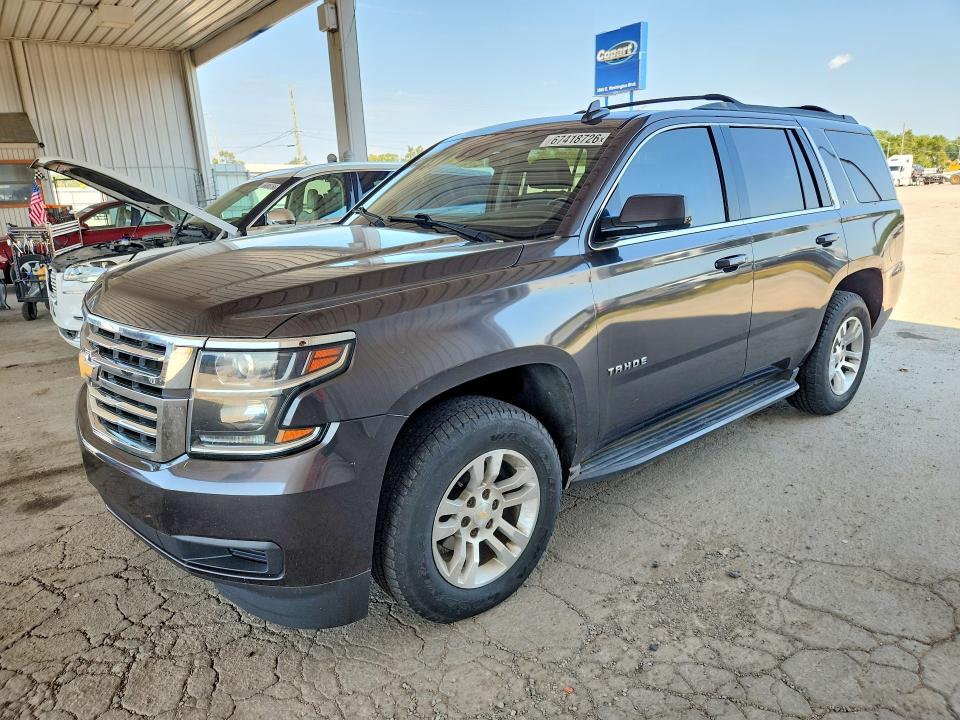 CHEVROLET TAHOE 2016 with VIN 1GNSKBKC1GR106590 - Photo from auction