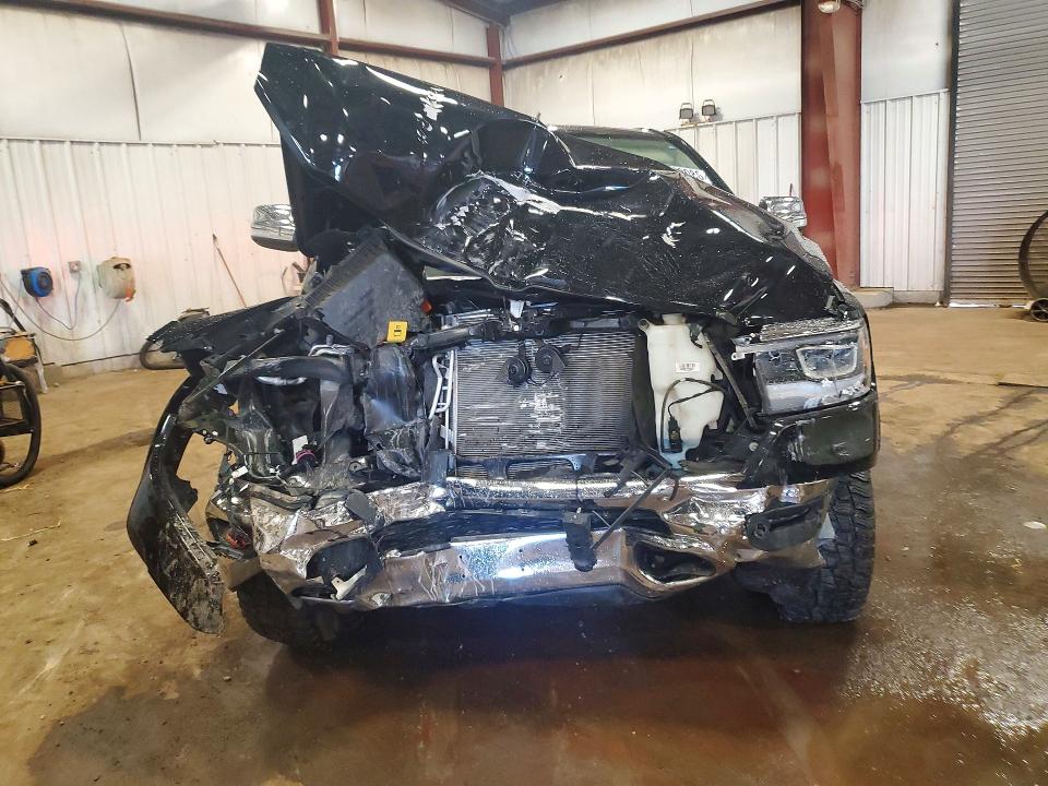 Photo 5 from auction – 2021 RAM 1500 with VIN 1C6SRFJT1MN789978