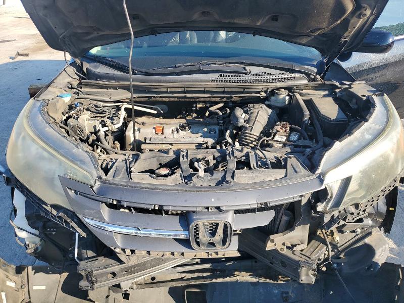 Photo 12 from auction – 2013 HONDA CR-V with VIN 2HKRM3H73DH510592
