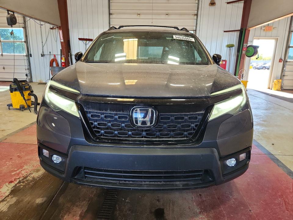 Photo 5 from auction – 2020 HONDA PASSPORT with VIN 5FNYF8H92LB011901