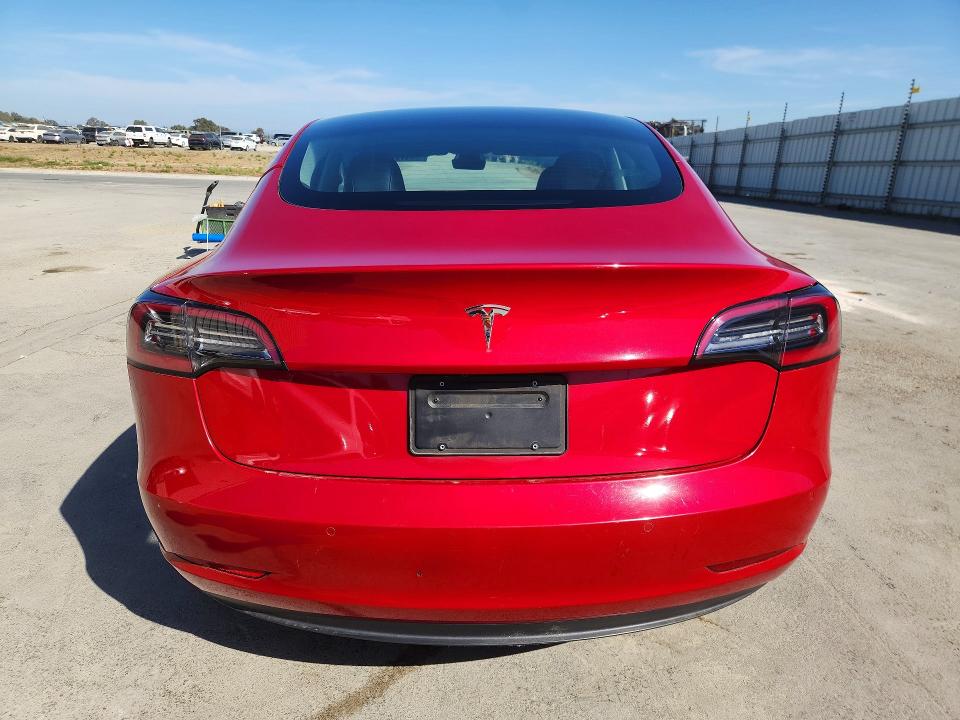 Photo 6 from auction – 2022 TESLA MODEL 3 with VIN 5YJ3E1EA4NF303880