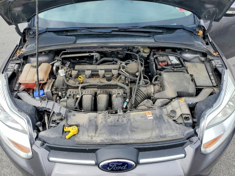 Photo 11 from auction – 2014 FORD FOCUS with VIN 1FADP3F2XEL227313