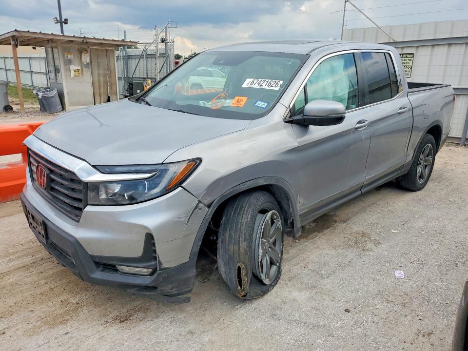 HONDA RIDGELINE 2023 with VIN 5FPYK3F58PB027466 - Photo from auction