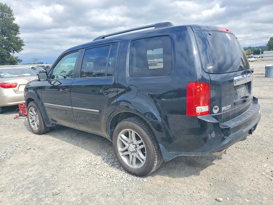 Photo 2 from auction – 2014 HONDA PILOT with VIN 5FNYF4H90EB019801