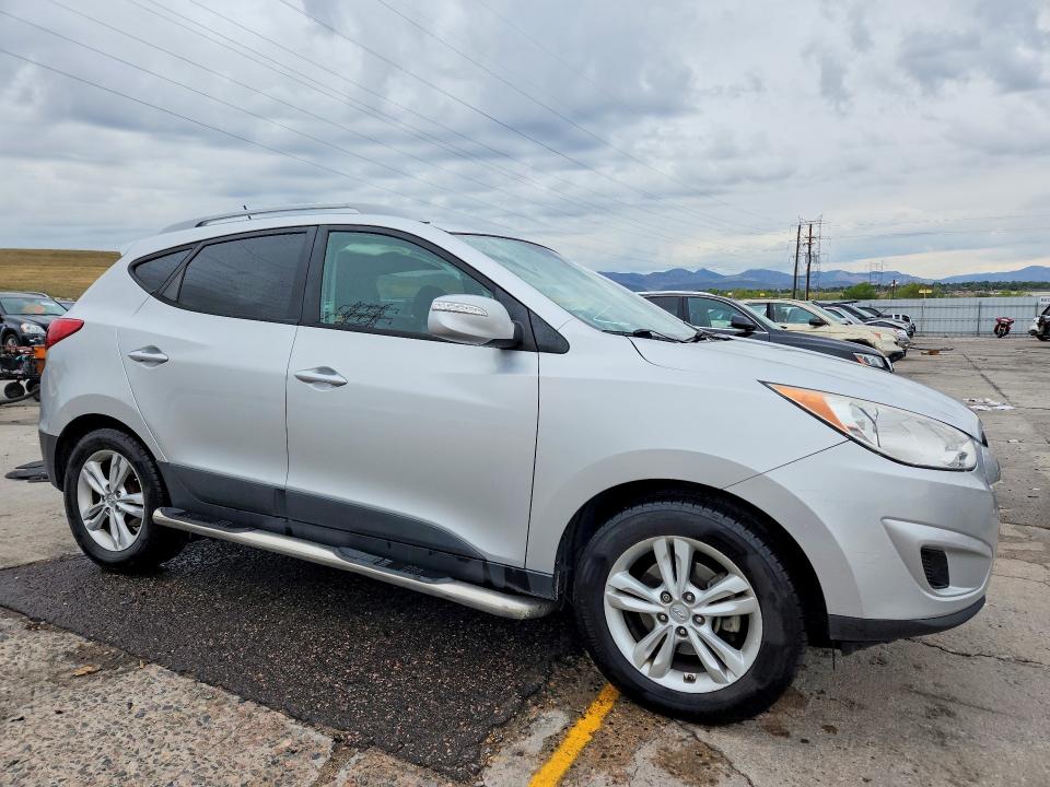 Снимка 4 от търг – 2012 HYUNDAI TUCSON с VIN KM8JUCAC9CU394688