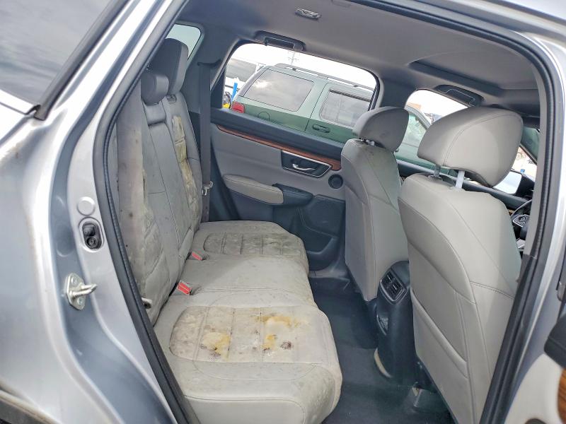Photo 11 from auction – 2018 HONDA CR-V with VIN 7FARW2H98JE019939