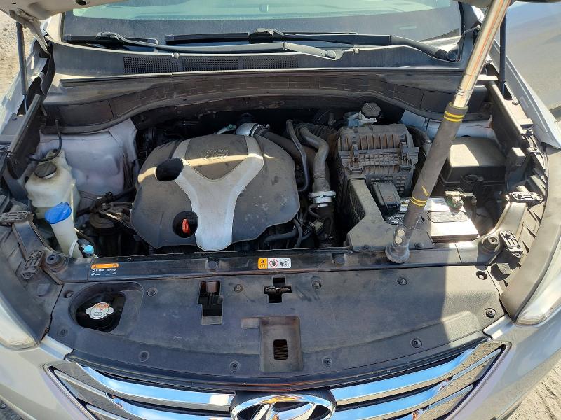 Photo 12 from auction – 2014 HYUNDAI SANTA FE with VIN 5XYZU3LA4EG181705