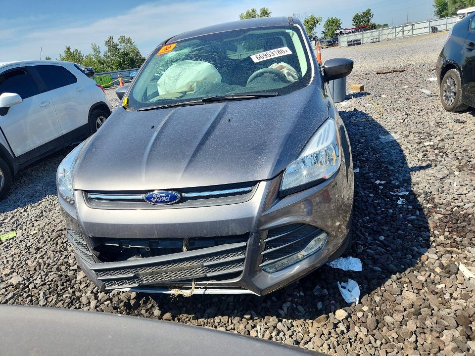 Photo 5 from auction – 2014 FORD ESCAPE with VIN 1FMCU9G92EUA47634