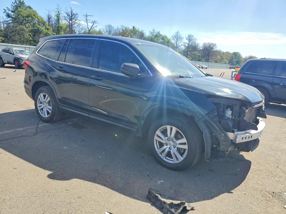 Photo 4 from auction – 2016 HONDA PILOT with VIN 5FNYF6H10GB111211