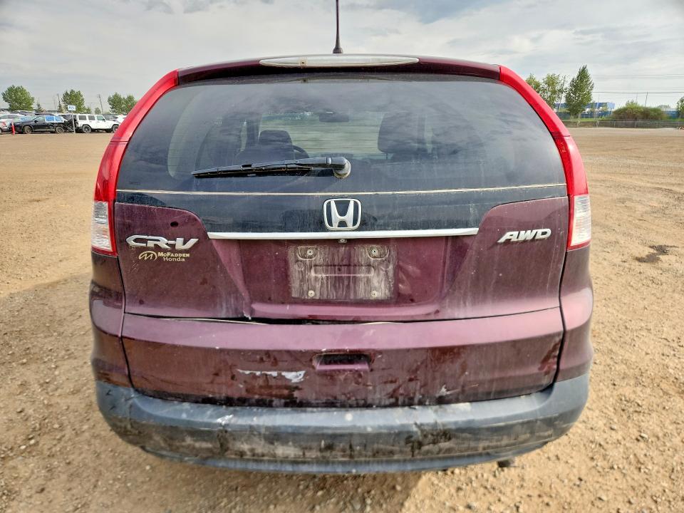 Photo 6 from auction – 2014 HONDA CR-V with VIN 2HKRM4H58EH131500