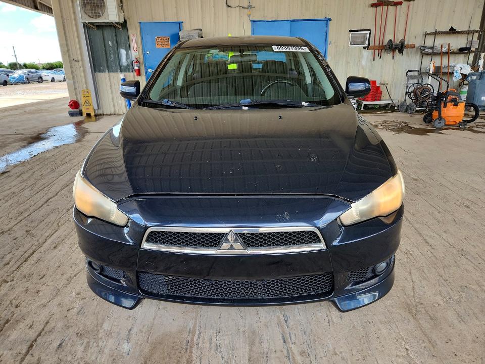 Photo 5 from auction – 2009 MITSUBISHI LANCER with VIN JA3AU86W29U019978