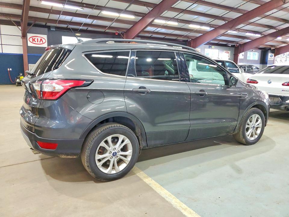 Photo 3 from auction – 2018 FORD ESCAPE with VIN 1FMCU9GD9JUB78770