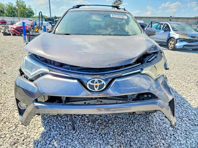 Photo 5 from auction – 2016 TOYOTA RAV4 with VIN 2T3RFREV9GW475361