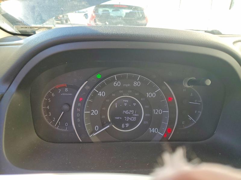 Photo 9 from auction – 2015 HONDA CR-V with VIN 2HKRM4H30FH696355