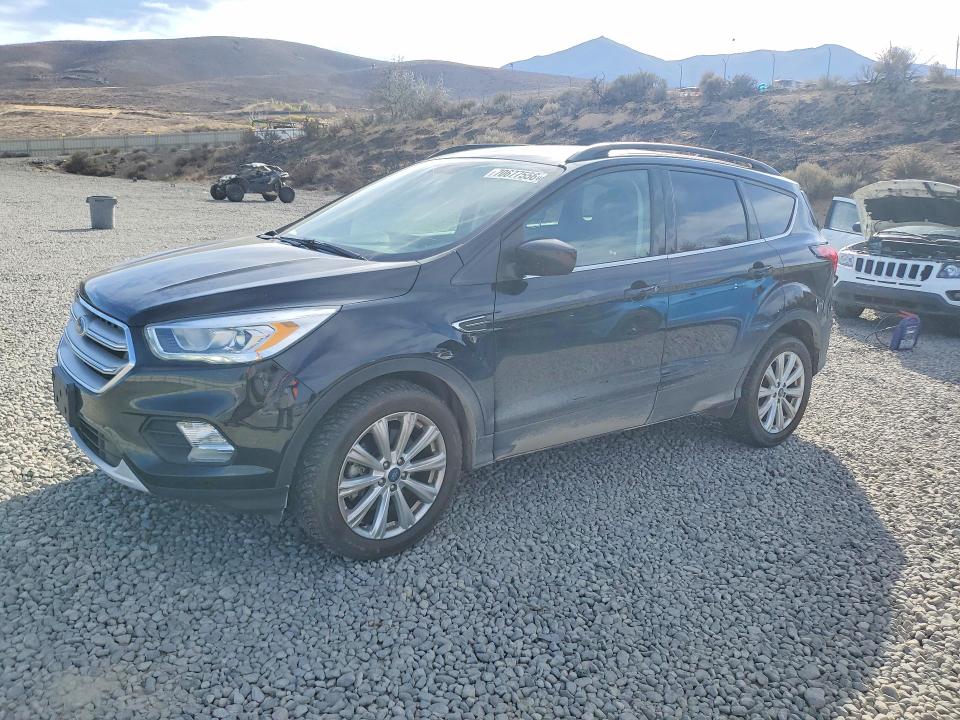 FORD ESCAPE 2019 with VIN 1FMCU9HD5KUC20836 - Photo from auction