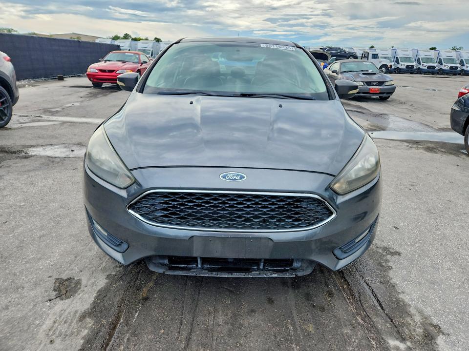 Foto 5 de la subasta – 2017 FORD FOCUS con VIN 1FADP3H22HL218817