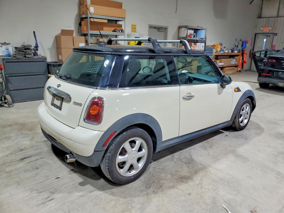 Photo 3 from auction – 2009 MINI COOPER with VIN WMWMF33519TW77463