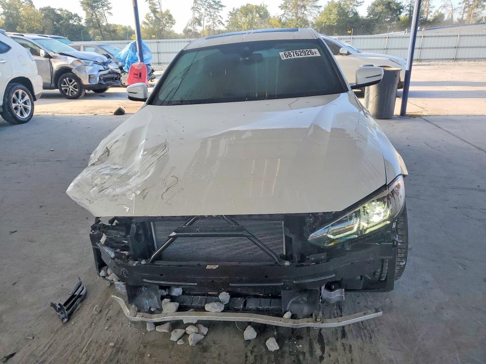 Photo 5 from auction – 2023 BMW I4 with VIN WBY73AW0XPFN63534