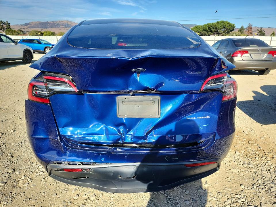 Снимка 6 от търг – 2021 TESLA MODEL Y с VIN 5YJYGAEEXMF150441